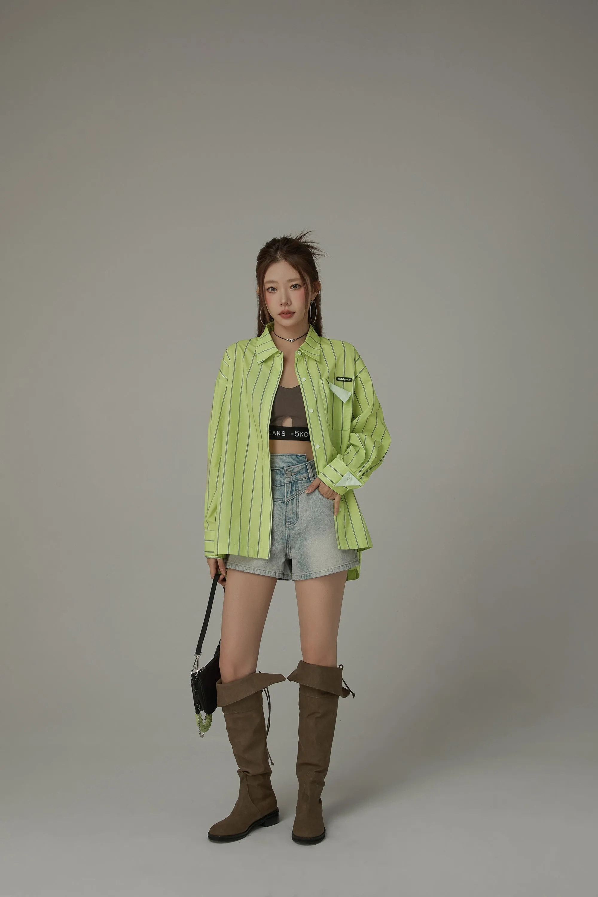 Asymmetrical Button Distressed Denim Shorts