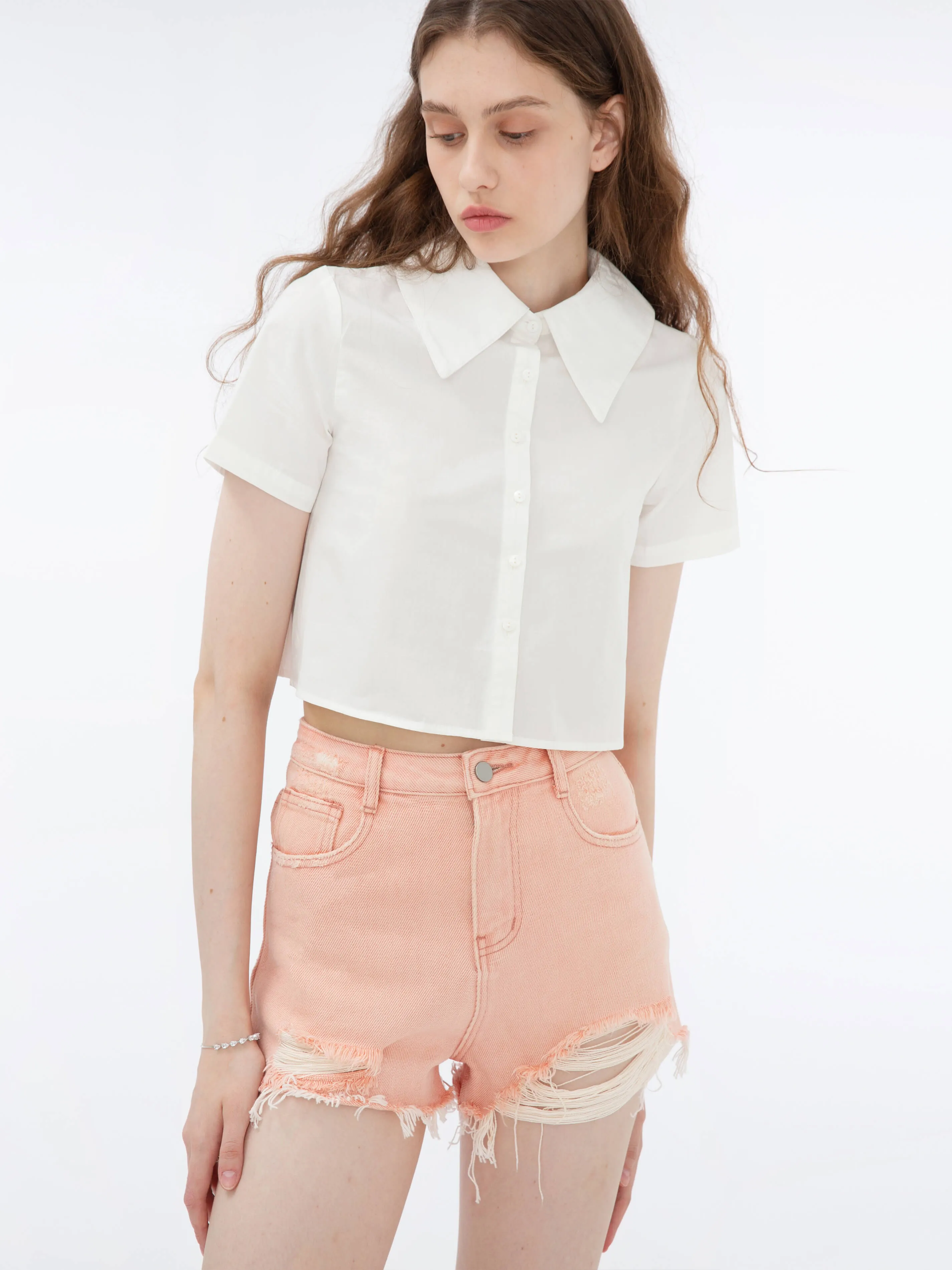 Raw Edge Distressed Mini Shorts